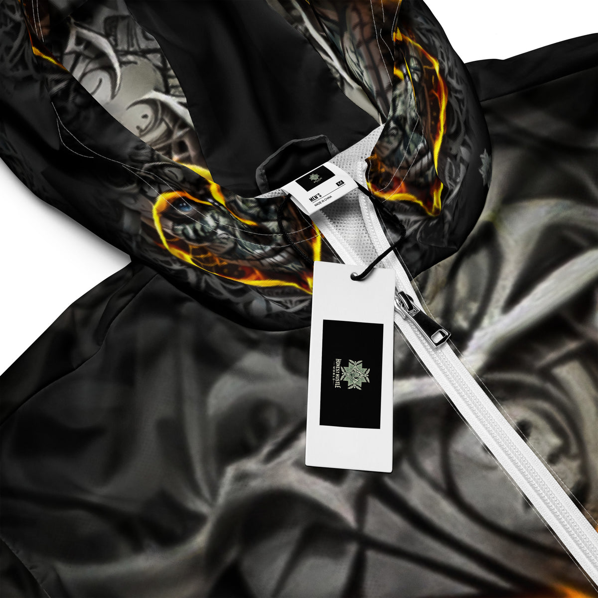 Inferno Skull Vision windbreaker by Honest Hustle World with skull-and-flame graphic, product detail view