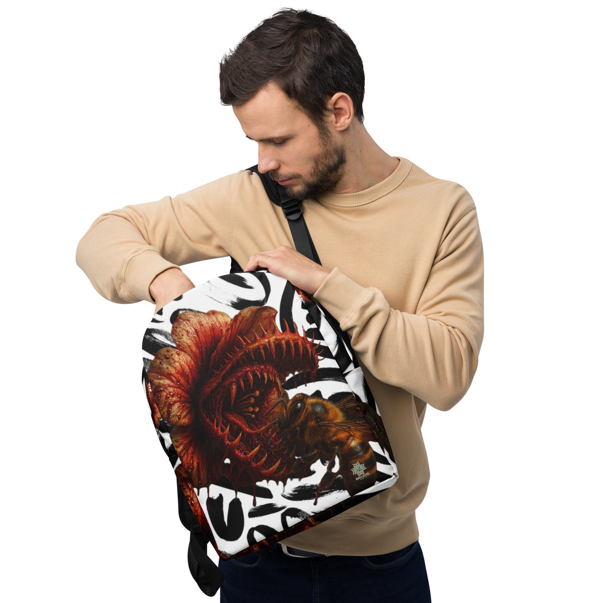 Backpack from Honest Hustle World — BLOOM Trap & Truth flower-and-bee graphic, back view