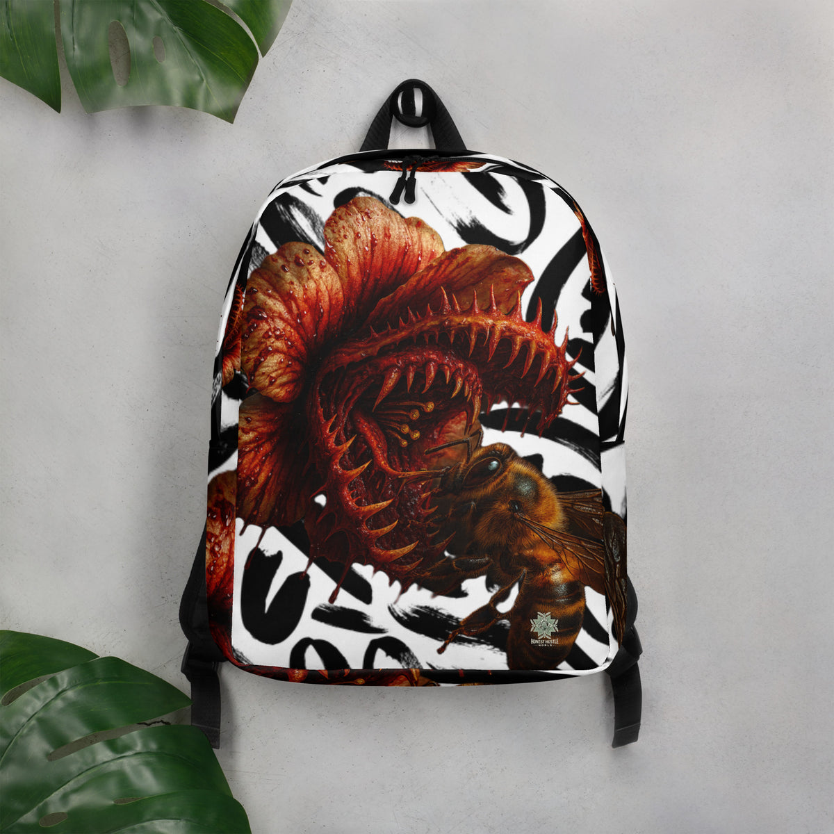 Backpack from Honest Hustle World — BLOOM Trap & Truth flower-and-bee graphic, back view