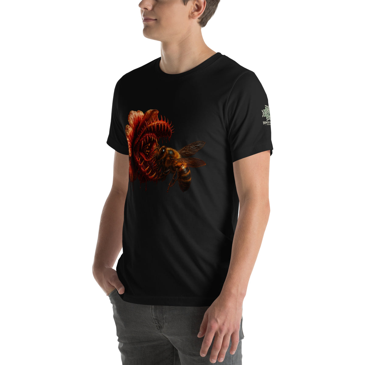 Tee from Honest Hustle World — BLOOM Trap & Truth flower-and-bee graphic, left-front view